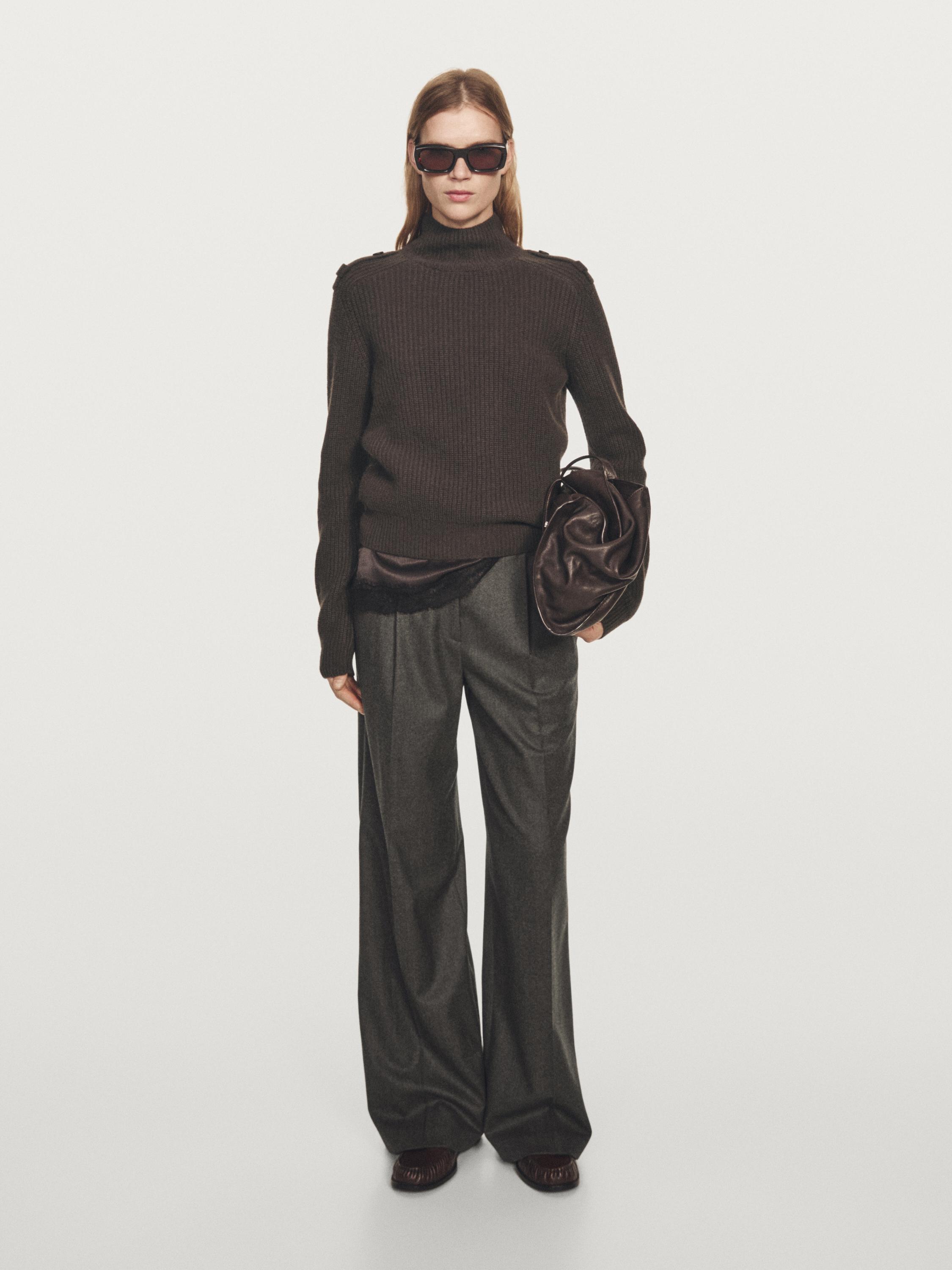 Knit sweater with shoulder detail